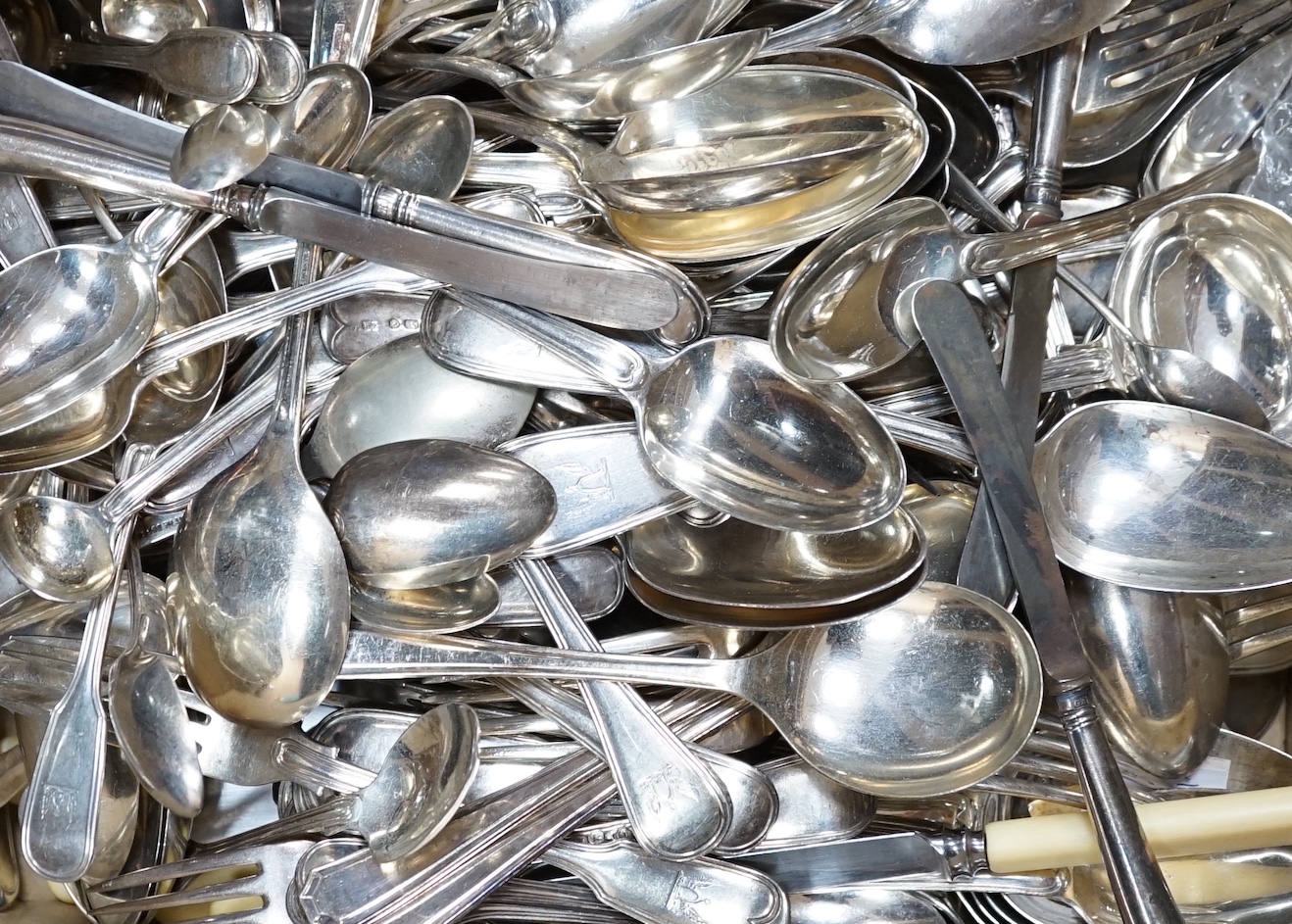 A quantity of mainly 19th century silver fiddle and thread pattern flatware, various dates and makers including thirteen table forks by William Eaton, London, 1844, ten table forks, Hayne & Cater, London, 1844, together